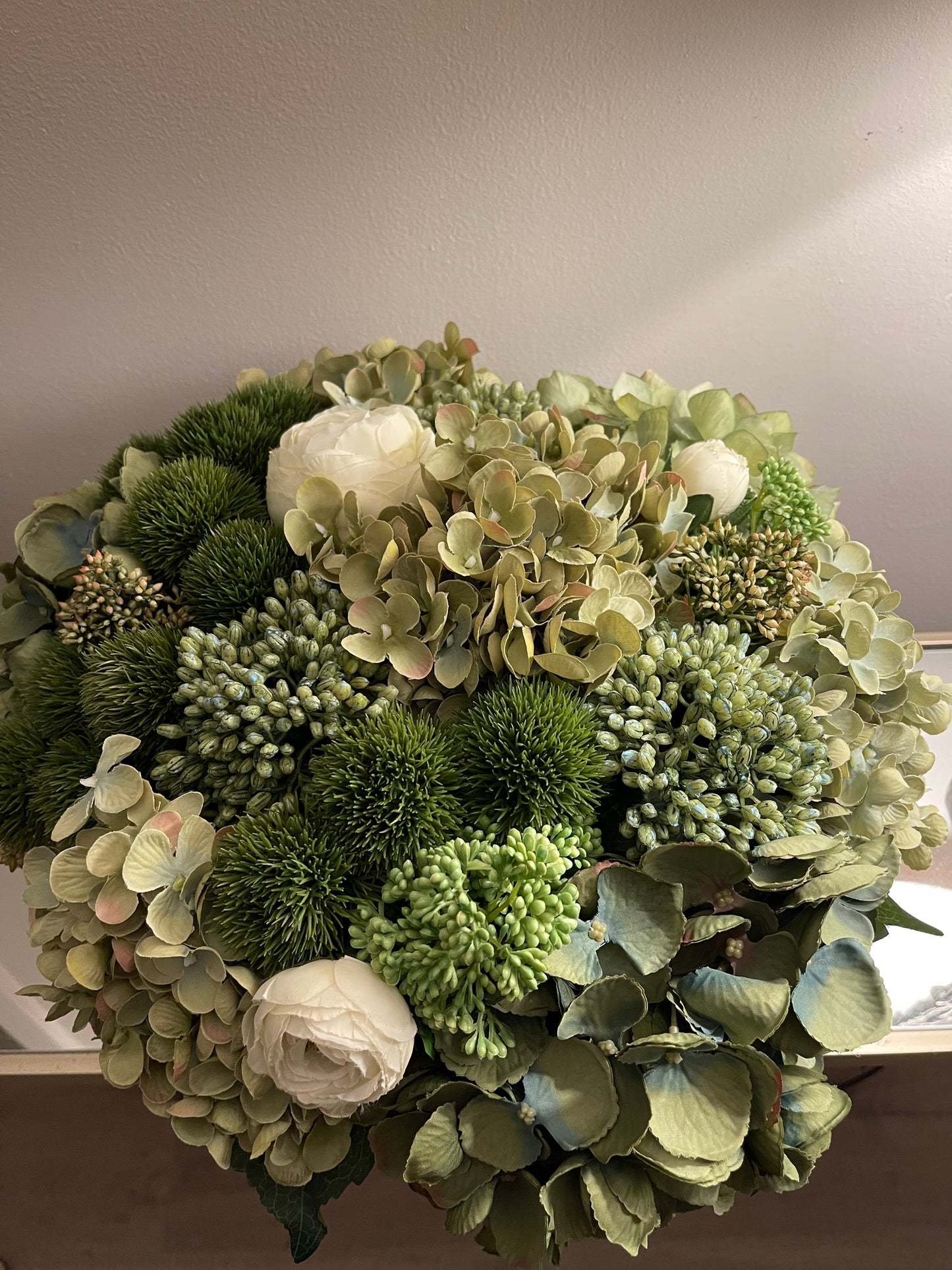 Green Hydrangeas in black bowl