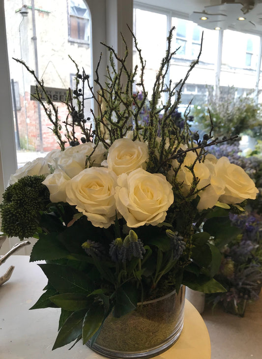 Roses with twigs in Mossed cylinder